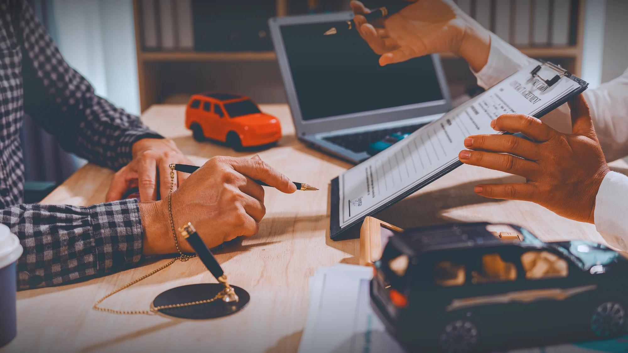 Consultation on auto insurance coverage and policy options with an insurance professional